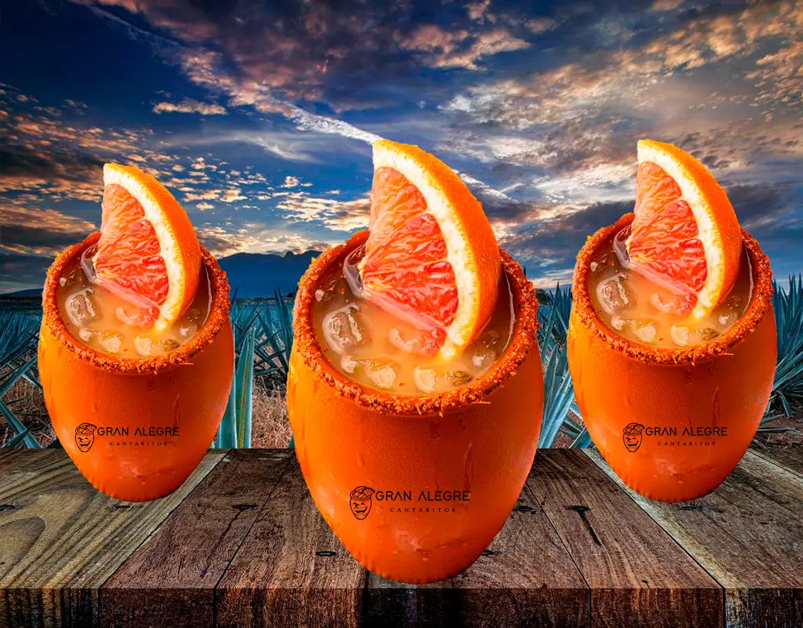 Tres cantaritos Gran Alegre servidos con cítricos